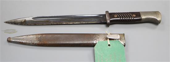 A WWII Third Reich Manser K98 bayonet and scabbard S.817, code WA 883